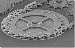 Figure 2.10. This tiny gear and chain drive is actually a silicon chip photographed with an electron microscope. The gears are smaller tha