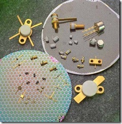 Figure 2.4. These analog components, scattered across two silicon wafers, show the variety of shapes and sizes these components can take.
