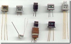 Figure 2.8. Transistors always have three wires, although the metal case is sometimes used as the third wire. Electricity flows in and out